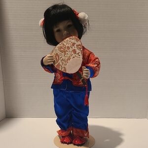 Traditional Blue and Red Kids Doll